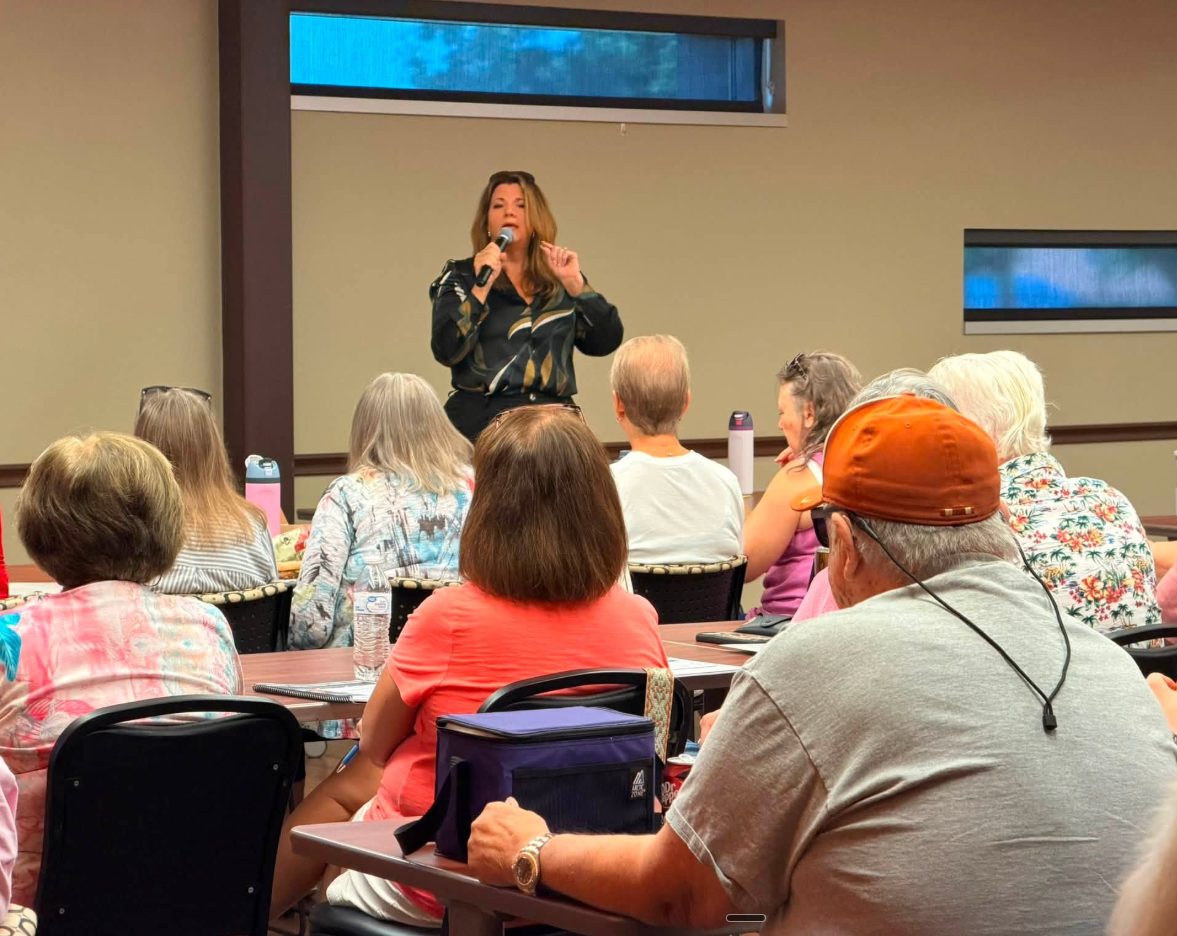 Sherri Combs speaking to seniors during a Silver Streak fraud-awareness workshop.